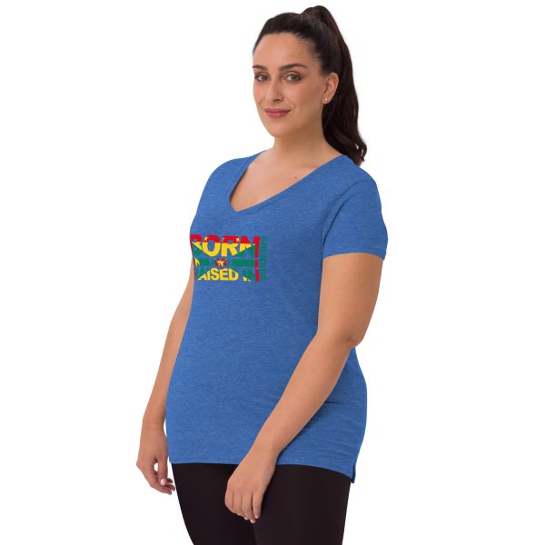 A woman wearing a blue t-shirt with the word surf on it.