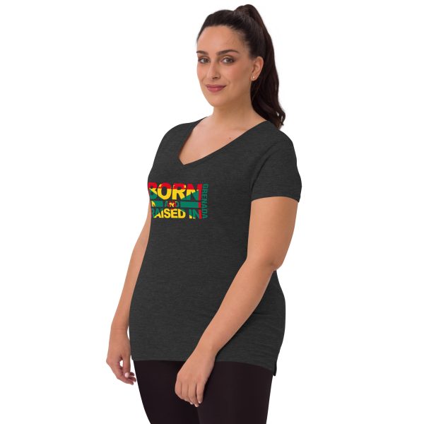 A woman wearing a black t-shirt with the word surf on it.