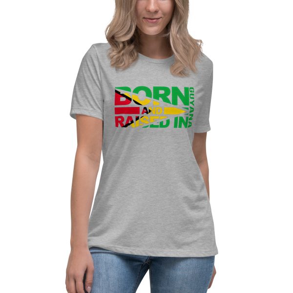 A woman wearing jeans and a t-shirt with the words born in guyana