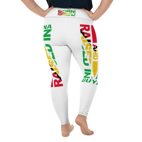 A person wearing white pants with rasta colors on them.