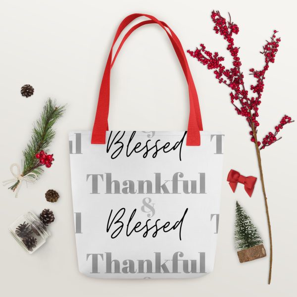 A bag that says " blessed thankful thankful " on it.