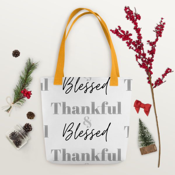 A bag that says " blessed thankful blessed " on it.