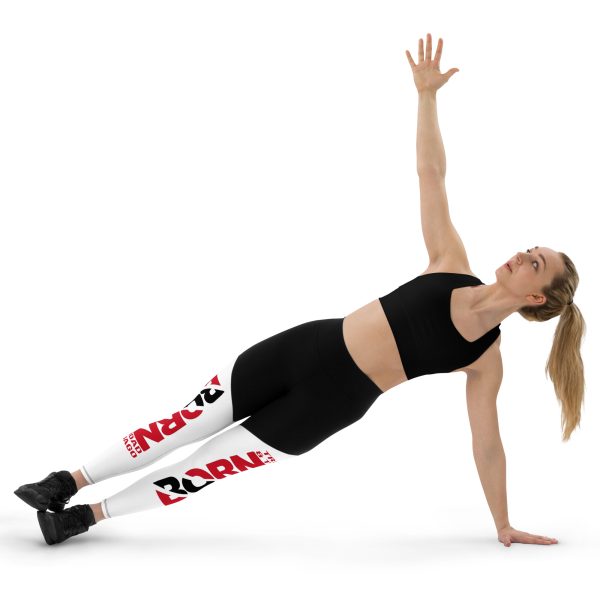 A woman is doing an exercise on the floor.