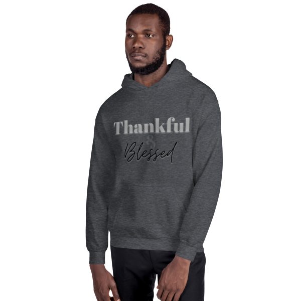 A man wearing a hoodie that says thankful blessed.