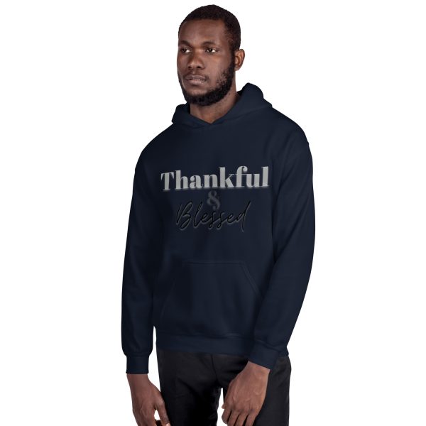 A man wearing a hoodie that says thankful and blessed.