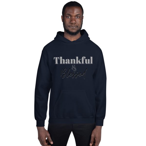 A man wearing a hoodie with the words thankful and blessed written on it.