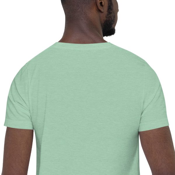 A man wearing a light green t-shirt.