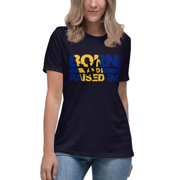 A woman wearing jeans and a t-shirt with the words born and raised written in yellow, blue and white.