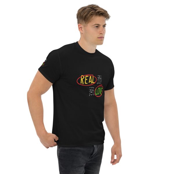 A man wearing a black shirt with the words " real is fun ".