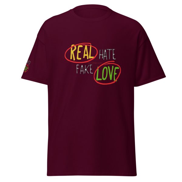 A maroon t-shirt with the words real hate fake love written in red and yellow.